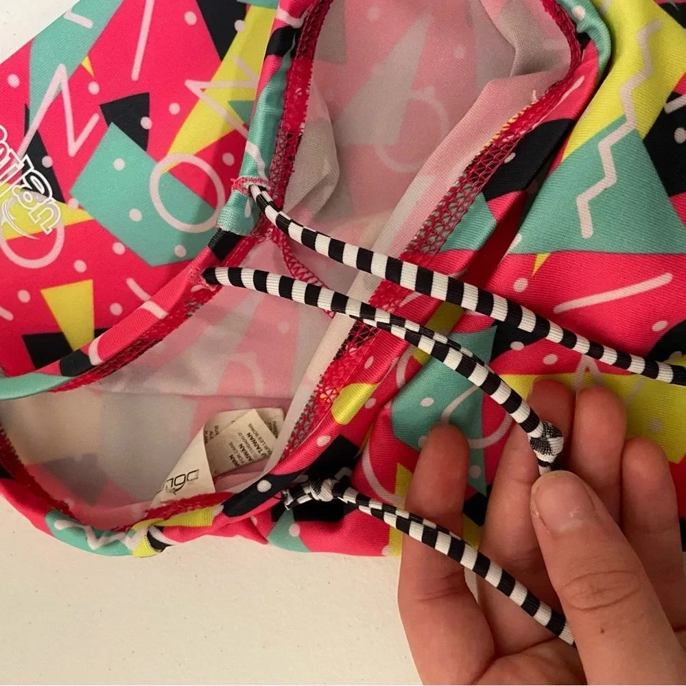 EUC | Dolfin girl’s Uglies patterned drag swim pants —‎ large